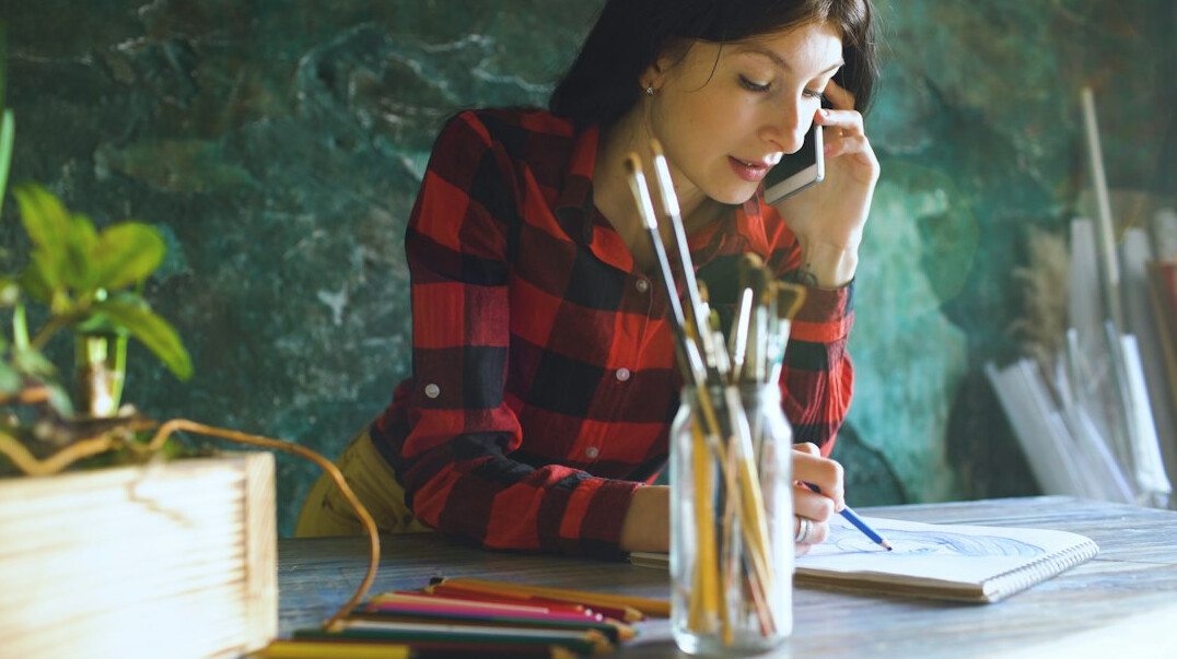 mystery writer at desk with notebook